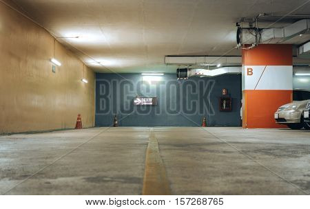 Underground parking with exit light box and car