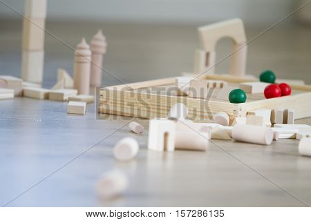 noname wooden bulding blocks, building castles and houses from wooden blocks at home
