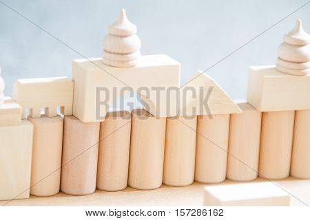 noname wooden bulding blocks, building castles and houses from wooden blocks at home