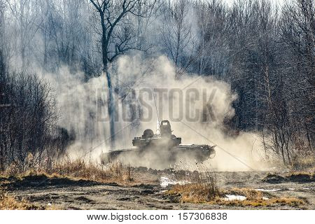 Russian tank shot on a forest road