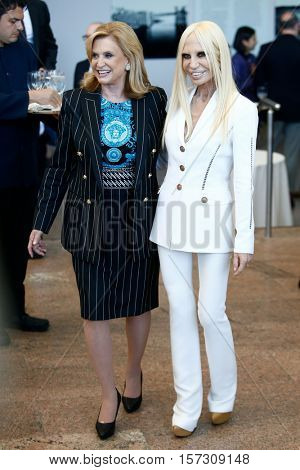 NEW YORK-MAY 5: Designer Donatella Versace (R) attends the ribbon cutting ceremony for the Anna Wintour Costume Center Grand Opening at the Metropolitan Museum of Art on May 5, 2014 in New York City.