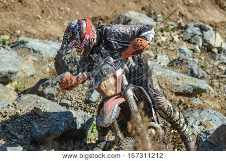 VLADIVOSTOK, RUSSIA - OCTOBER 10: competition On the edge 2016 Hard Enduro Rally with a KTM motorcycle. The hardest enduro rally in the world. October 10, 2016 in Vladivostok, Russia