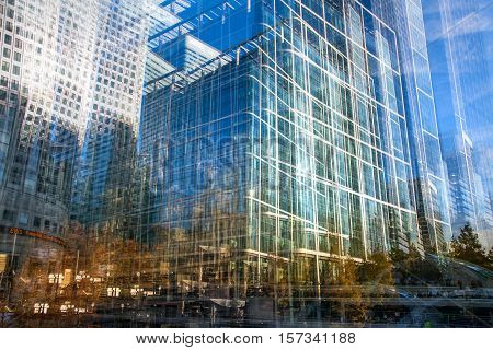 Multiple exposure effect image. Abstract background with modern office  buildings of London. Business and modern life concept.