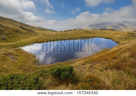 Clear lke clouds and Svydovets ridge. Carpathians