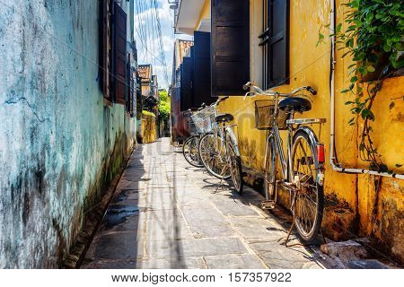 Bicycles Parked Near Yellow Wall, Hoi An Ancient Town