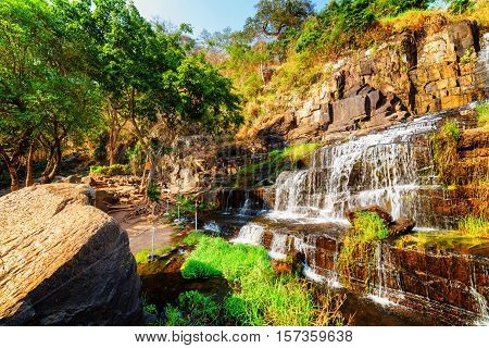 Amazing Natural Cascades Of Waterfall Among Green Woods