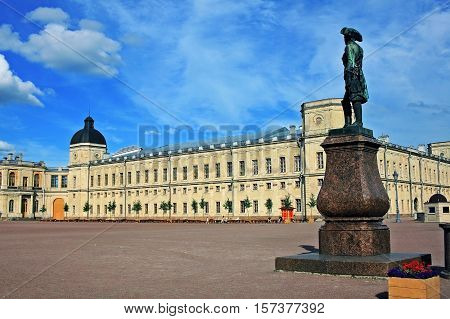 Gatchina Russia - 11 July 2016: Great Gatchina Palace and monument to Russian imperor Paul I. Palace was built in 1766-1781. Statue was installed in 1851.