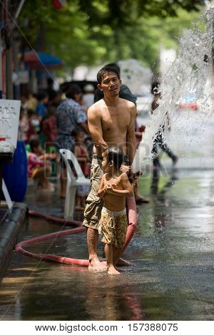Bangkok, Thailand - April 13, 2008 : 
During Songkran the Thai New Year's festival. Major streets are closed for traffic, and are used as arenas for water fights.