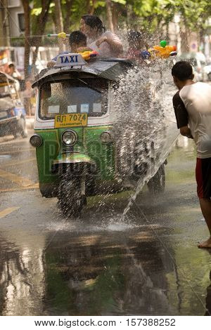 Bangkok, Thailand - April 13, 2008 : 
During Songkran the Thai New Year's festival. Major streets are closed for traffic, and are used as arenas for water fights.