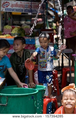 Bangkok, Thailand - April 13, 2008 : 
Children play with water guns during Songkran, the Thai New Year's festival.