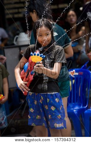 Bangkok, Thailand - April 13, 2008 : 
Children play with water guns during Songkran, the Thai New Year's festival.