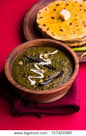 corn flour flat bread or roti or Makki Ki Roti with sarso da Saag or mustard leaves curry, Indian Food popular in winter season in north india