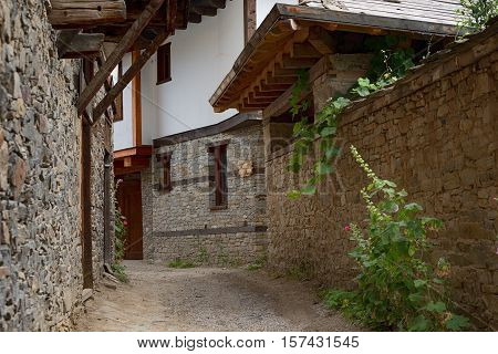 Summer time along the streets of the village of Kovachevitsa, Bulgaria