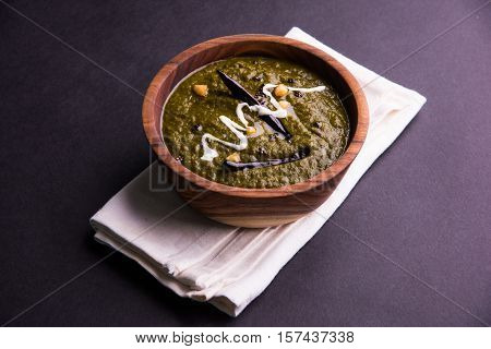 corn flour flat bread or roti or Makki Ki Roti with sarso da Saag or mustard leaves curry, Indian Food popular in winter season in north india