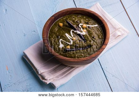 corn flour flat bread or roti or Makki Ki Roti with sarso da Saag or mustard leaves curry, Indian Food popular in winter season in north india