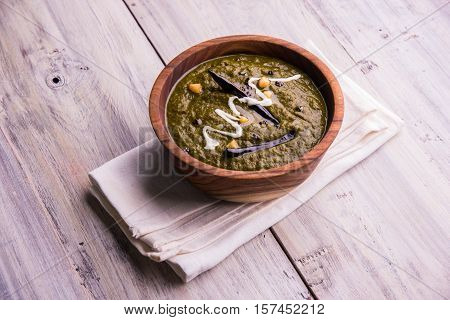 corn flour flat bread or roti or Makki Ki Roti with sarso da Saag or mustard leaves curry, Indian Food popular in winter season in north india