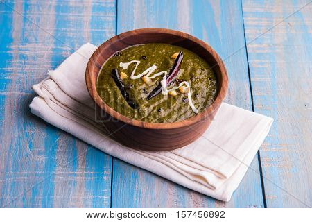 corn flour flat bread or roti or Makki Ki Roti with sarso da Saag or mustard leaves curry, Indian Food popular in winter season in north india