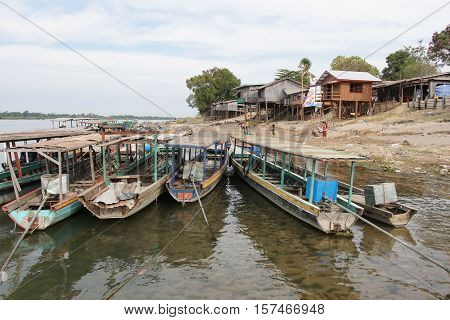 SI PHAN DON, LAOS - FEBRUARY 25, 2016: Typical village allong the Mekong river on February 25, 2016 in Laos, Asia
