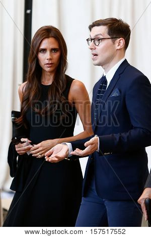 NEW YORK-MAY 5: Victoria Beckham (L) and guest attend the ribbon cutting ceremony for the Anna Wintour Costume Center Grand Opening at the Metropolitan Museum of Art on May 5, 2014 in New York City.