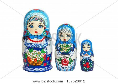 Three traditional Russian matryoshka dolls. Painted matryoshka. Matryoshka blue3 composite.