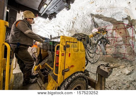 Gold mining underground. Drilling and explosive works.