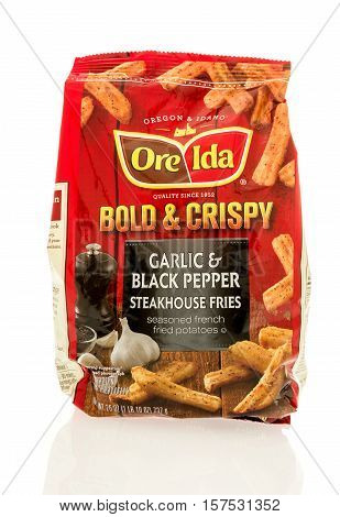 Winneconne WI - 20 November 2016: Bag of Ore Ida bold & crispy garlic & black pepper steakhouse fries on an isolated background.