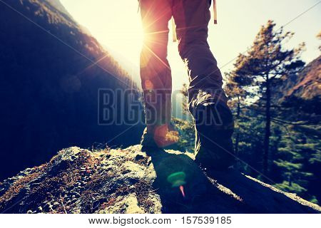 successful hiker enjoy the sunrise at the himalaya mountains