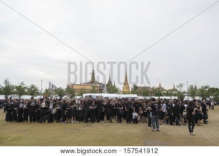 BANGKOK THAILAND - OCT 29 : the massive line up of mourners at Sanam Luang while the body of Thailand Bhumibol Adulyadej keep in Grand Palace on october 29 2016
