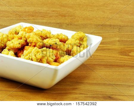 spicy rice crackers snack on wooden table