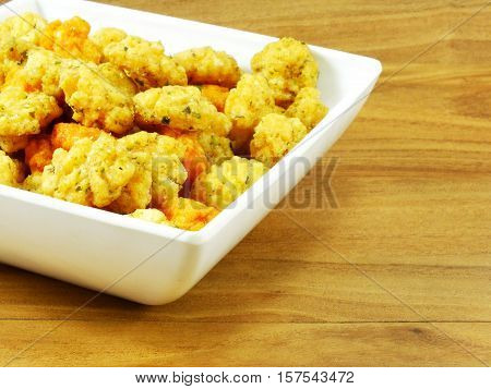 spicy rice crackers snack on wooden table