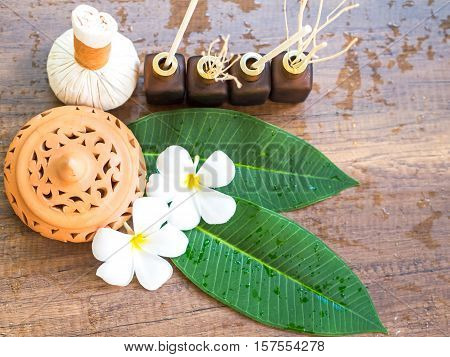 Spa massage compress balls herbal ball on the wooden with treaments spa Thailand select focus