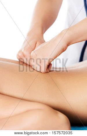 Woman having massage of body in the spa salon. Beauty treatment concept.