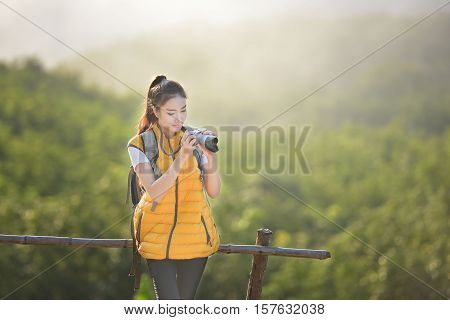 Woman tourist mountain mist. Nong Khai Thailand.