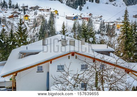 Aerial view on snow winter village in Ischgl place, famous winter skii resort in Austra and european travel landmark.