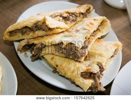 Traditional Georgian meat pie - khachapuri. The national cuisine of Georgia. Europe.