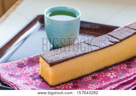 Castella - Traditional Japanese Sponge Cake And Hot Tea.