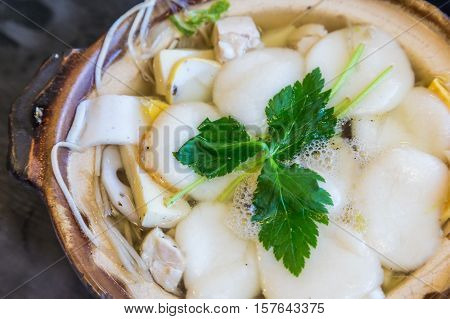 Traditional Shimabara Guzoni - Soup With Rice Cake And Seafood
