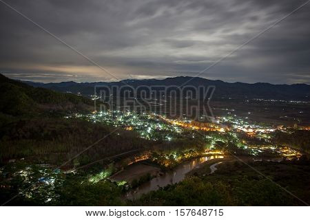Thaton Village Illuminated At Night, View From Above. Chiang Mai Province, Northern Thailand. Thai-m