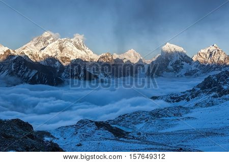 Everest Panoramic View From Renjo La Pass. Beautiful Mountain Valley Covered With Curly Clouds. Dram