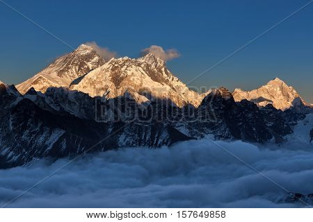 Sunset Over Everest Summit, View From Renjo La Pass. Amazing View Of Mountain Valley Covered With Cu