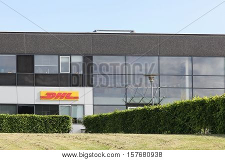 Skanderborg, Denmark - May 26, 2016: DHL building and office. DHL Express is a division of the german logistics company Deutsche Post DHL providing international express mail services