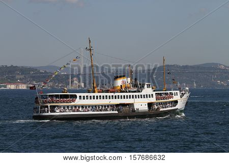 ISTANBUL TURKEY - JULY 30 2016: Sehir Hatlari ferry carry passengers between Asian and European sides of Istanbul. Sehir Hatlari was established in 1844 and now carry 150000 passengers a day.