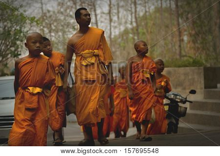 Tailand, Chiang Mai april 20, 2016. Three thai monks in actions 