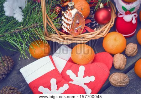 Branches of a Christmas tree on old boards. Christmas background. Christmas Socks. Christmas decorations. 2017 year. New Year background. Xmax background. Toned image.