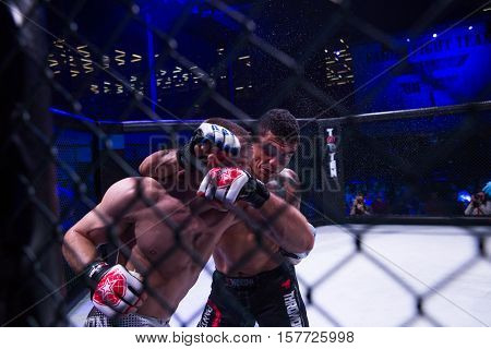 NOVI SAD SERBIA - NOVEMBER 05 2016 : MMA - SBC FIGHT TURNAMENT. ATHLETES IN THE RING EXTREME SPORT. FIGHT NIGHT PROFESIONAL ATHLETESSELECTIVE FOCUS WITH SHALLOW DEPTH OF FIELD NOVEMBER 05 2016 NOVI SAD SERBIA