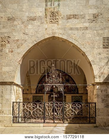 Arch with decorative lattice entrance of the Cathedral of Saint James in the Armenian Quarter of Jerusalem Israel