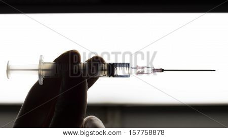 Doctor inject the medicine for the patient.