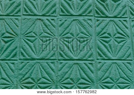 antique green painted wall pattern stamped plaster