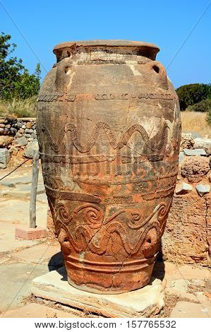 Ancient large decorated terracotta pot at the Minoan Malia ruins archaeological site Malia Crete Greece Europe.
