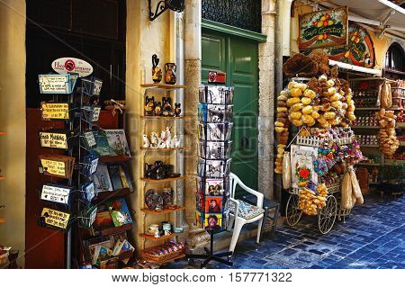 RETHYMNO, CRETE - SEPTEMBER 15, 2016 - Tourist gift shops along a shopping street in the old town Rethymno Crete Greece Europe, September 15, 2016.